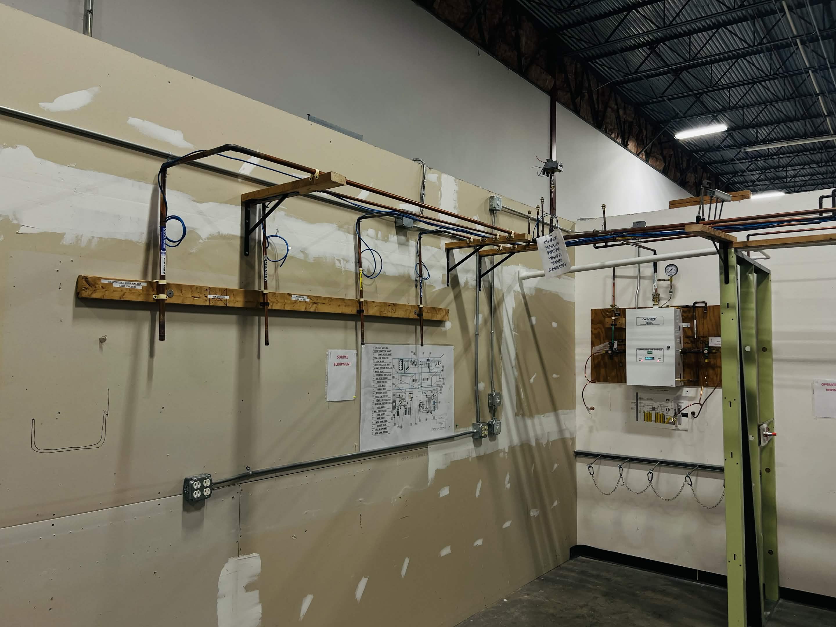 Corner view of medical gas training lab piping